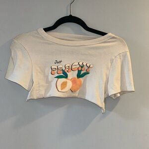peach color crop top graphic tee